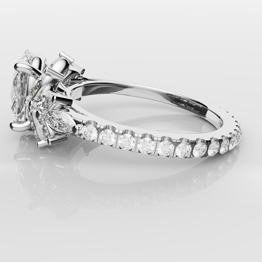 Oval Diamond Engagement Ring With Marquise Detailing