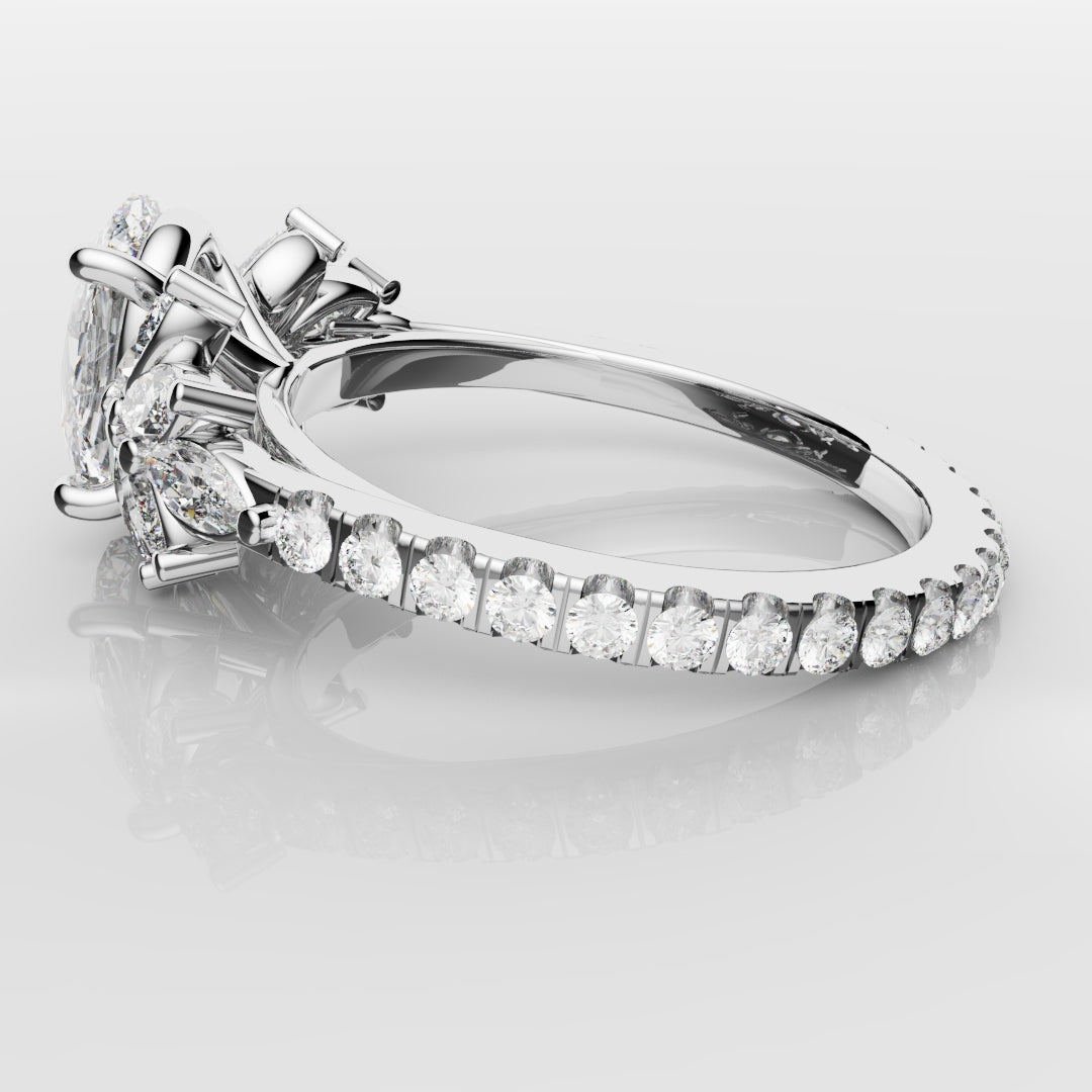 Oval Diamond Engagement Ring With Marquise Detailing