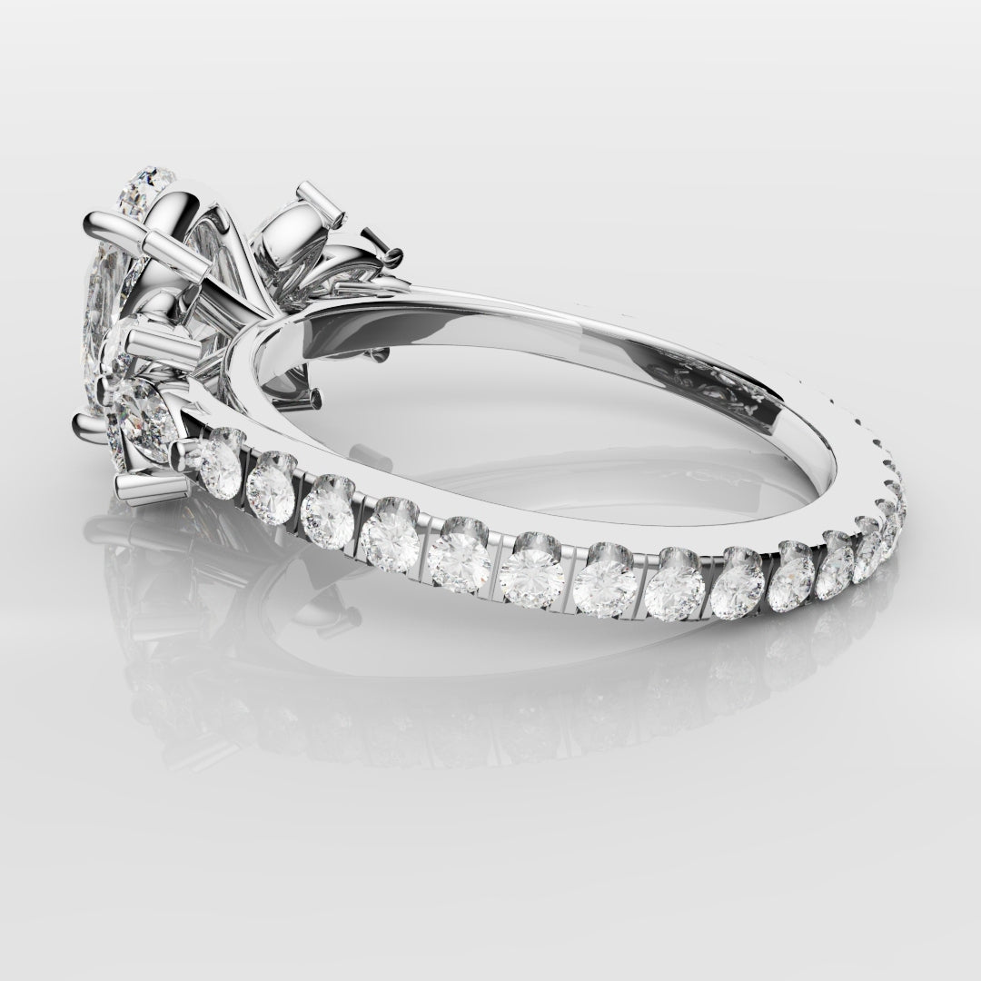 Oval Diamond Engagement Ring With Marquise Detailing