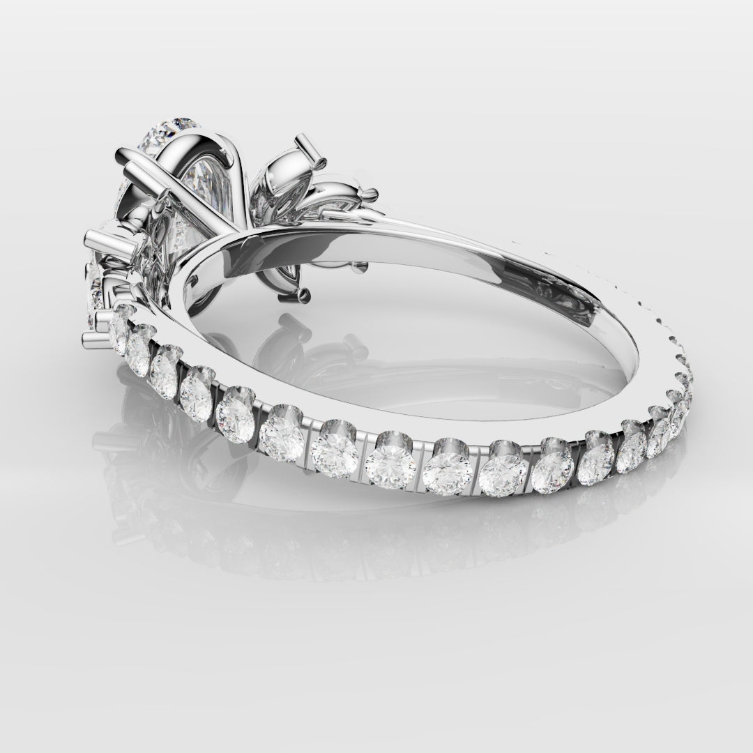 Oval Diamond Engagement Ring With Marquise Detailing