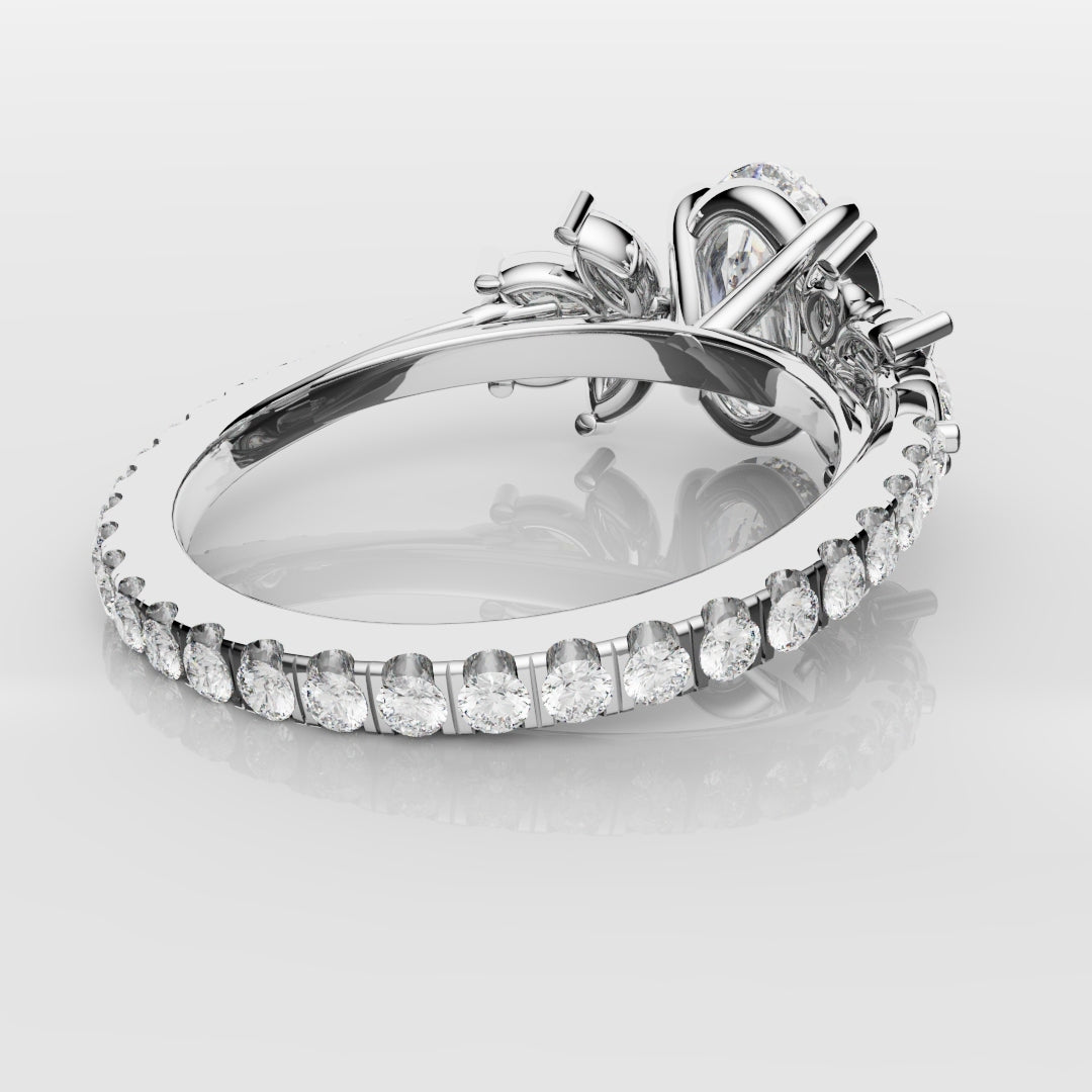 Oval Diamond Engagement Ring With Marquise Detailing