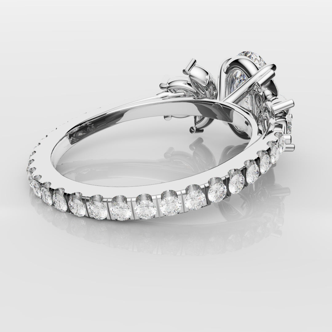 Oval Diamond Engagement Ring With Marquise Detailing