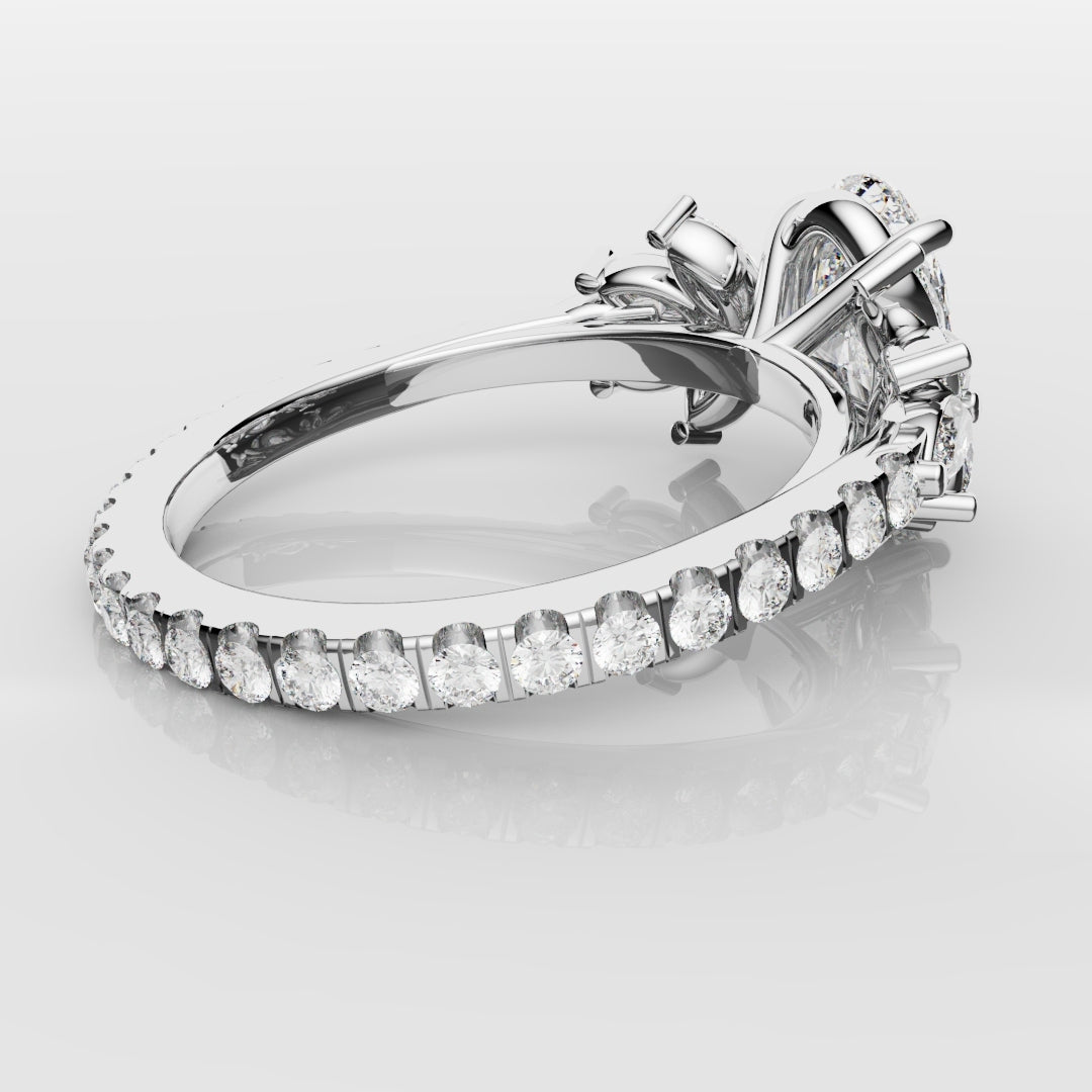 Oval Diamond Engagement Ring With Marquise Detailing