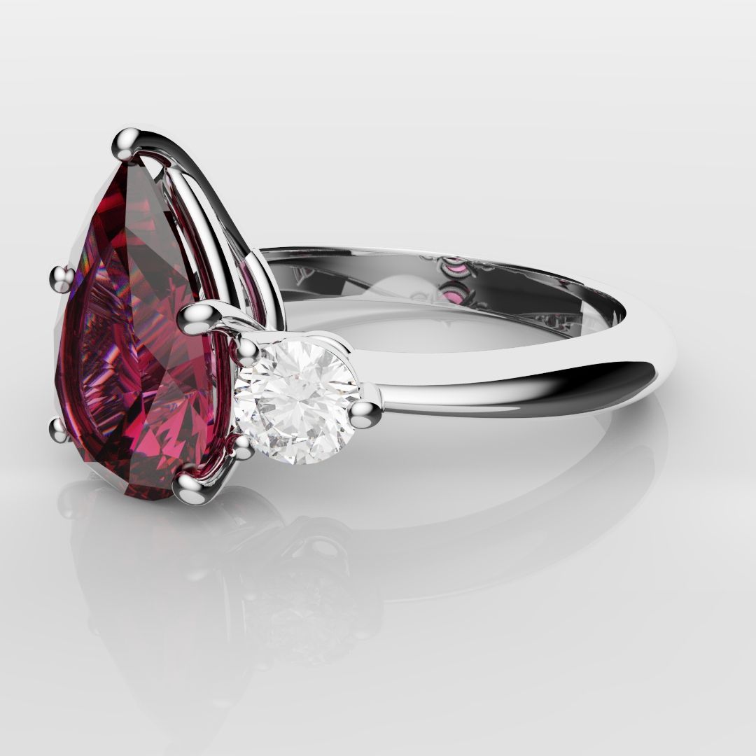 Pear Ruby Trilogy Engagement Ring