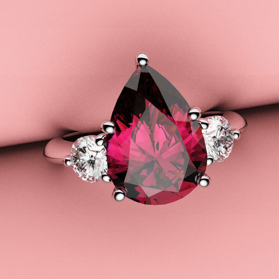 bespoke pear shaped ruby and diamond engagement ring