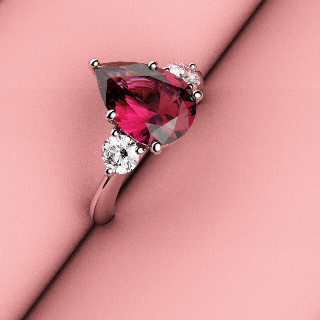 ruby and diamond trilogy engagement ring