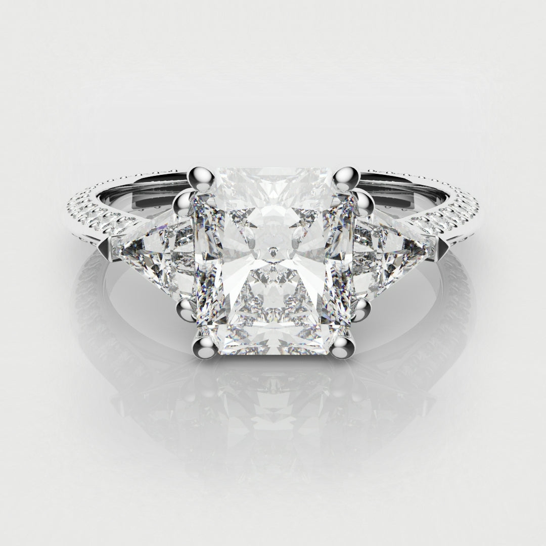 radiant cut trilogy engagement ring
