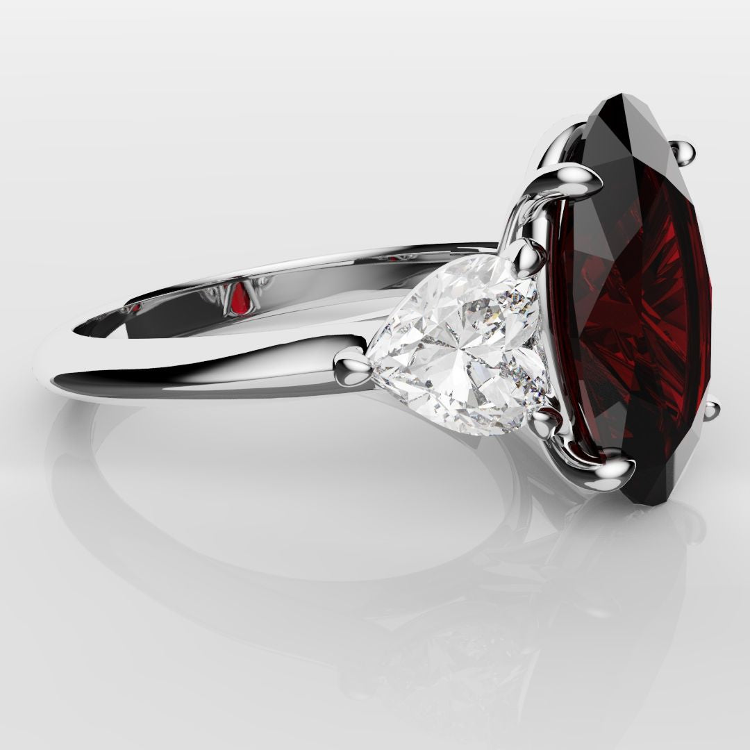 Oval Ruby and Heart Diamond Trilogy Engagement Ring