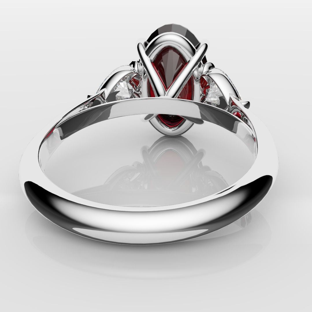 Oval Ruby and Heart Diamond Trilogy Engagement Ring