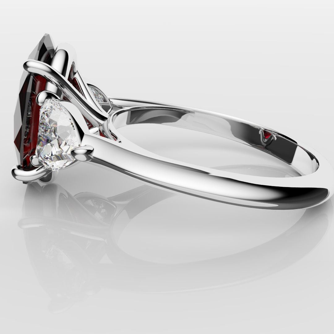 Oval Ruby and Heart Diamond Trilogy Engagement Ring
