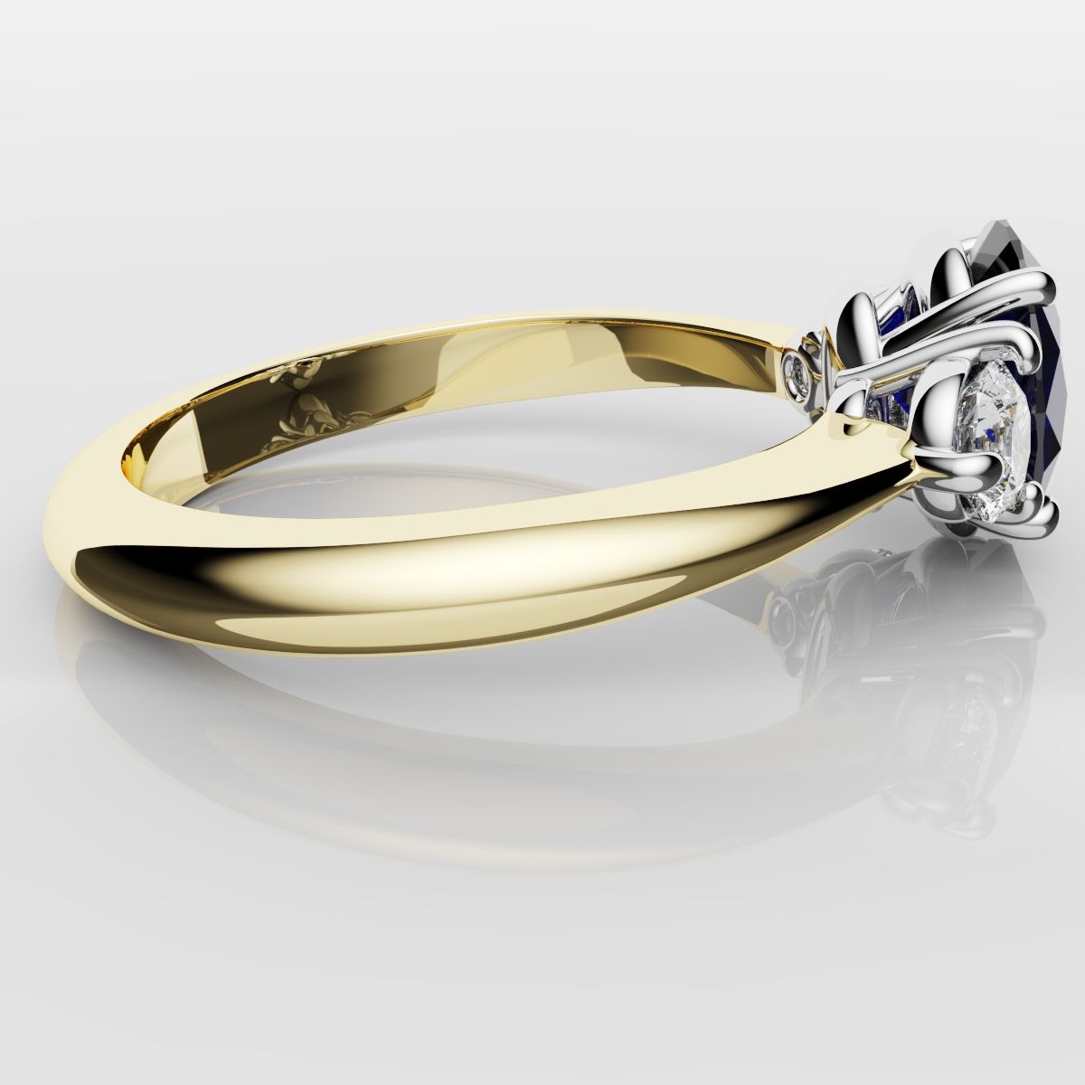 Oval Sapphire and Diamond Trilogy Engagement Ring