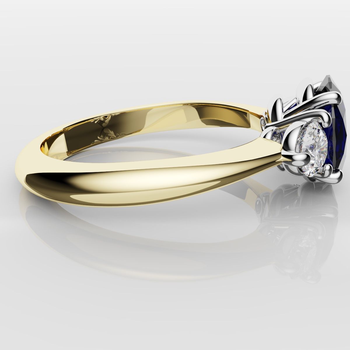 Oval Sapphire and Diamond Trilogy Engagement Ring