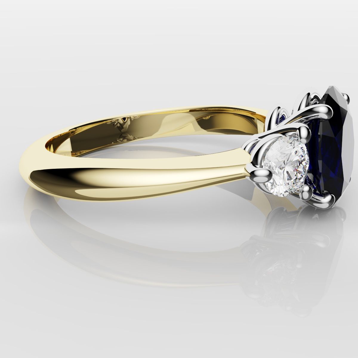 Oval Sapphire and Diamond Trilogy Engagement Ring