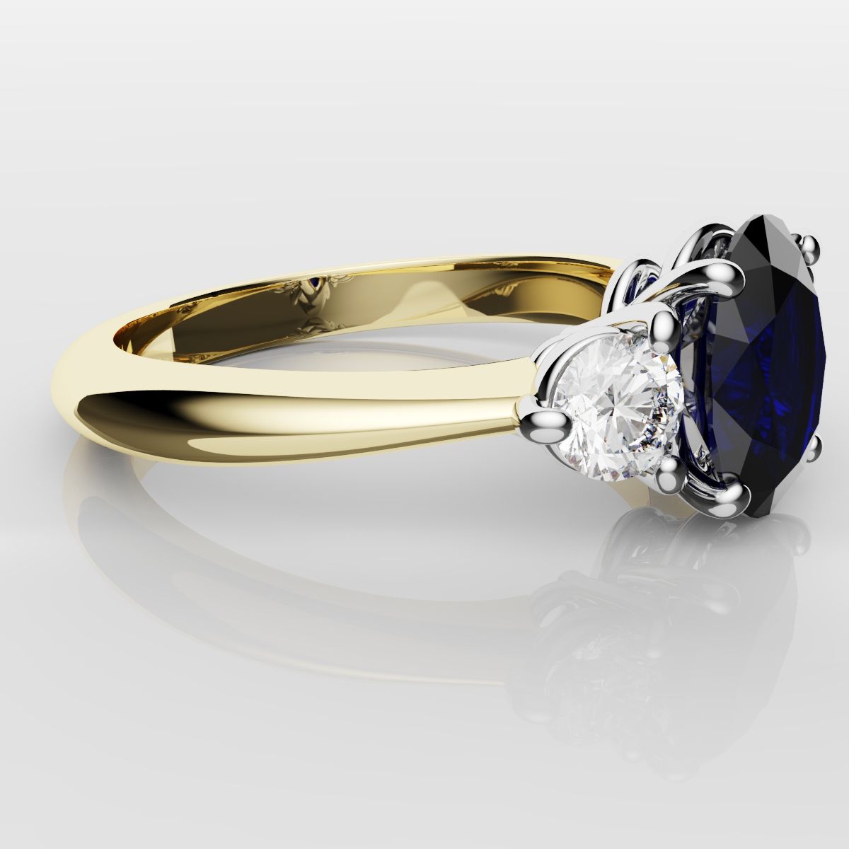 Oval Sapphire and Diamond Trilogy Engagement Ring