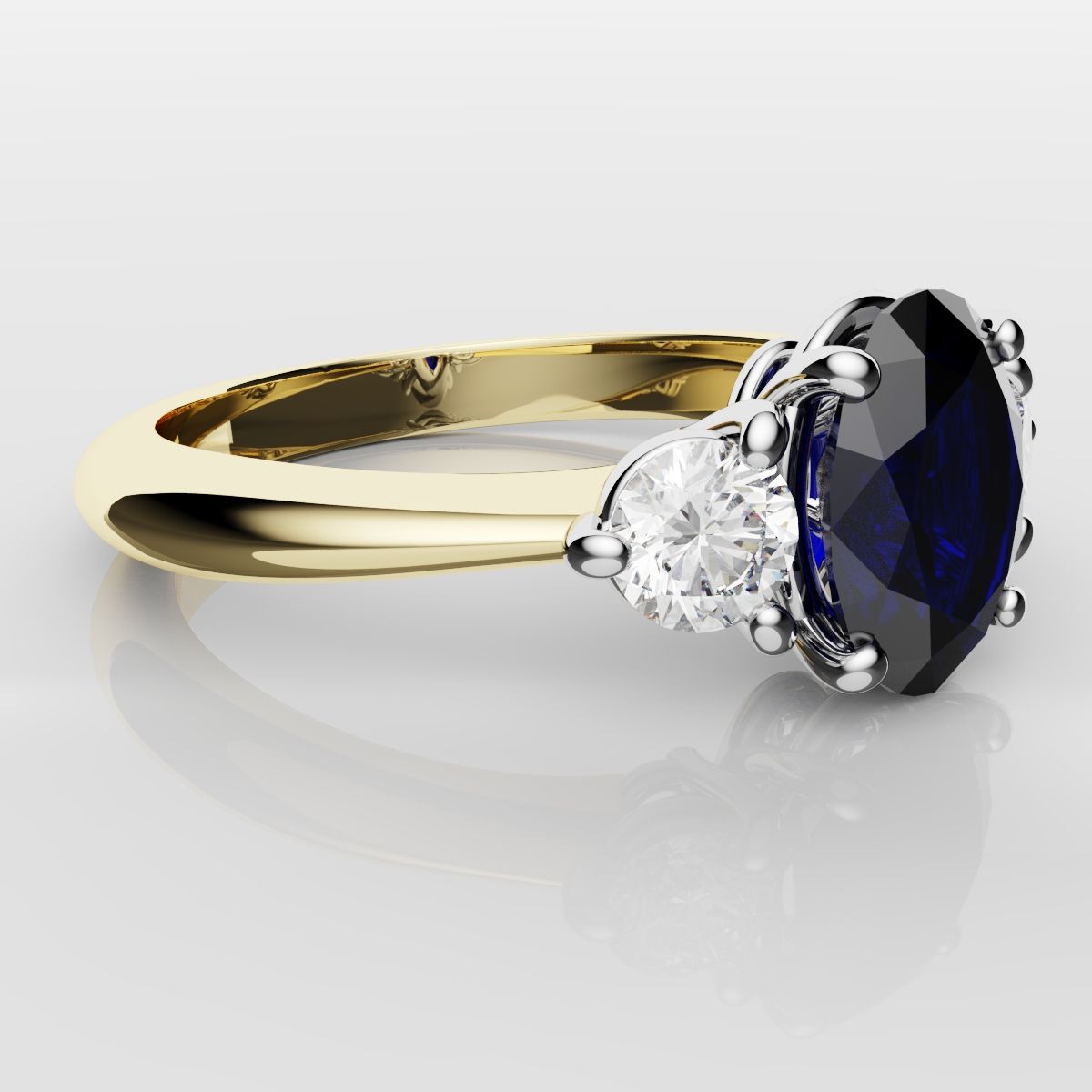 Oval Sapphire and Diamond Trilogy Engagement Ring