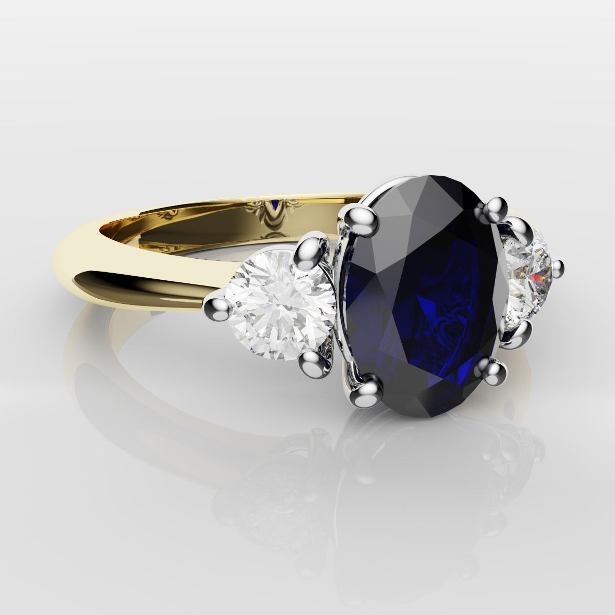 Oval Sapphire and Diamond Trilogy Engagement Ring