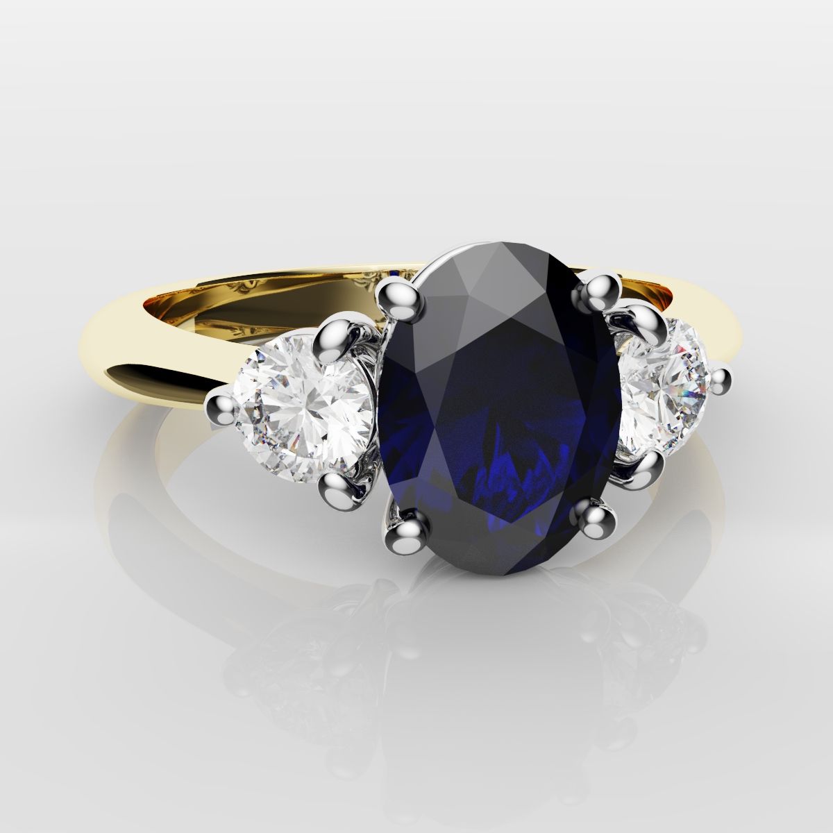 Oval Sapphire and Diamond Trilogy Engagement Ring