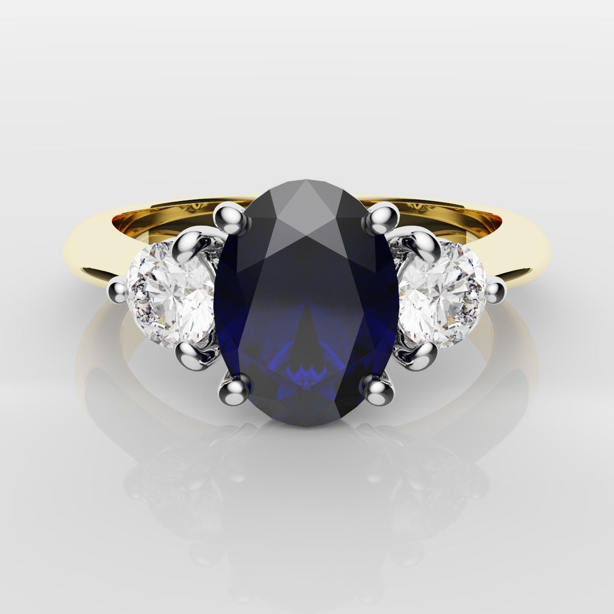Oval Sapphire and Diamond Trilogy Engagement Ring