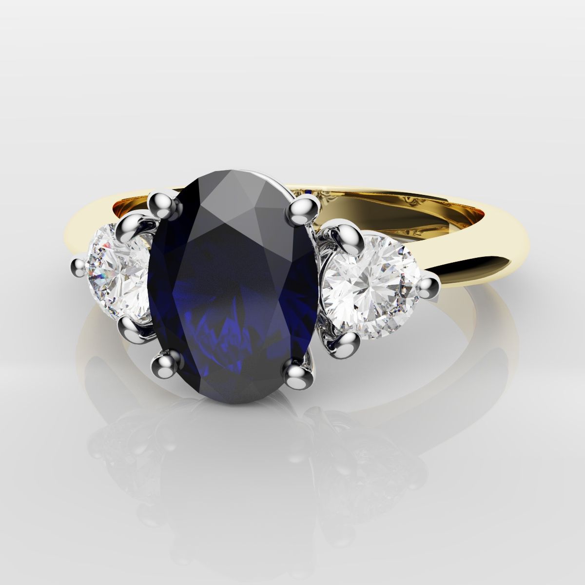 Oval Sapphire and Diamond Trilogy Engagement Ring