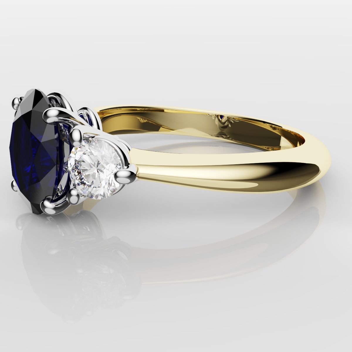 Oval Sapphire and Diamond Trilogy Engagement Ring