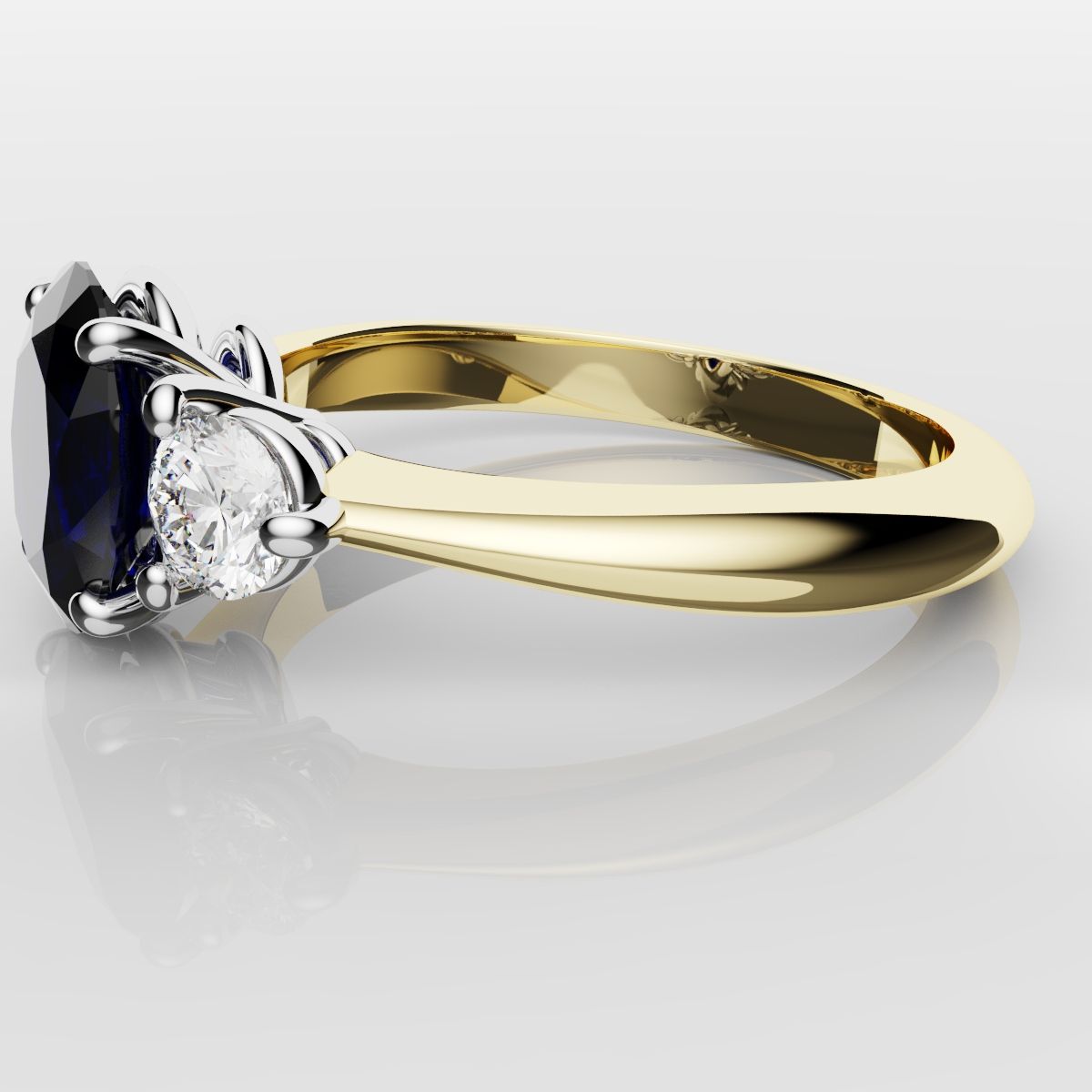 Oval Sapphire and Diamond Trilogy Engagement Ring