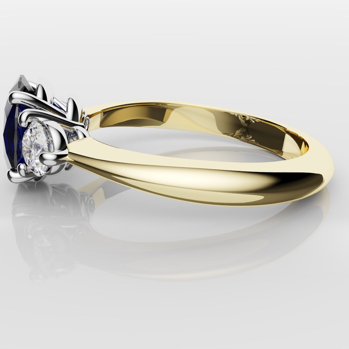Oval Sapphire and Diamond Trilogy Engagement Ring