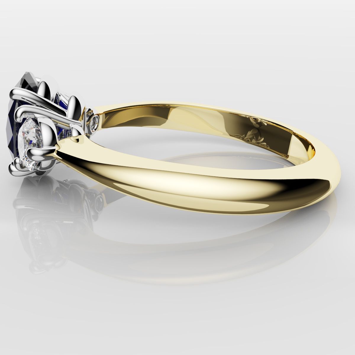 Oval Sapphire and Diamond Trilogy Engagement Ring