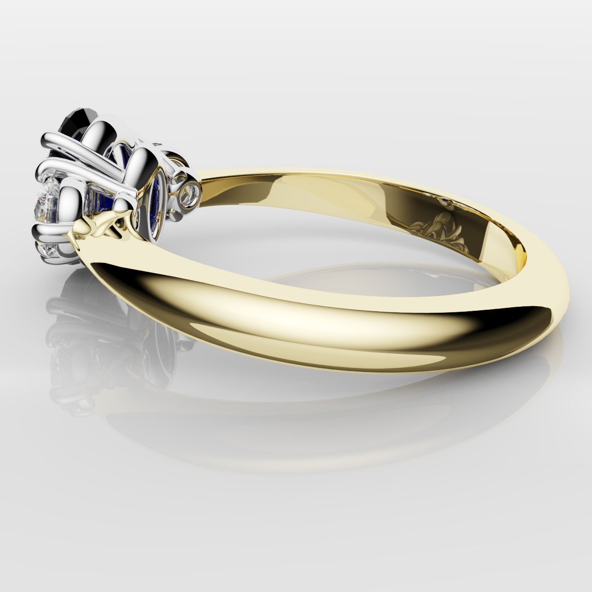 Oval Sapphire and Diamond Trilogy Engagement Ring