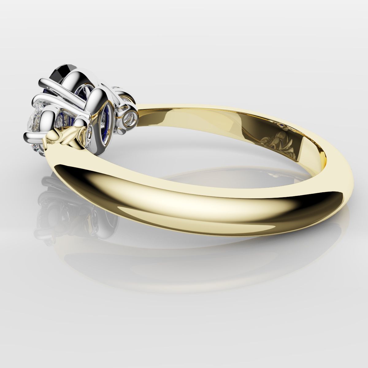 Oval Sapphire and Diamond Trilogy Engagement Ring