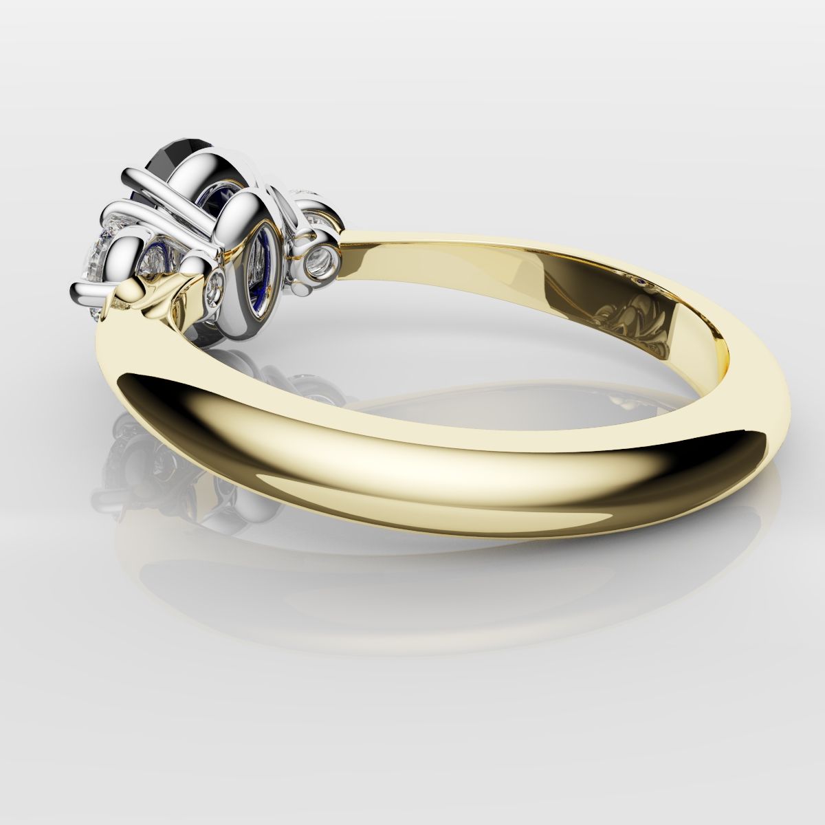 Oval Sapphire and Diamond Trilogy Engagement Ring