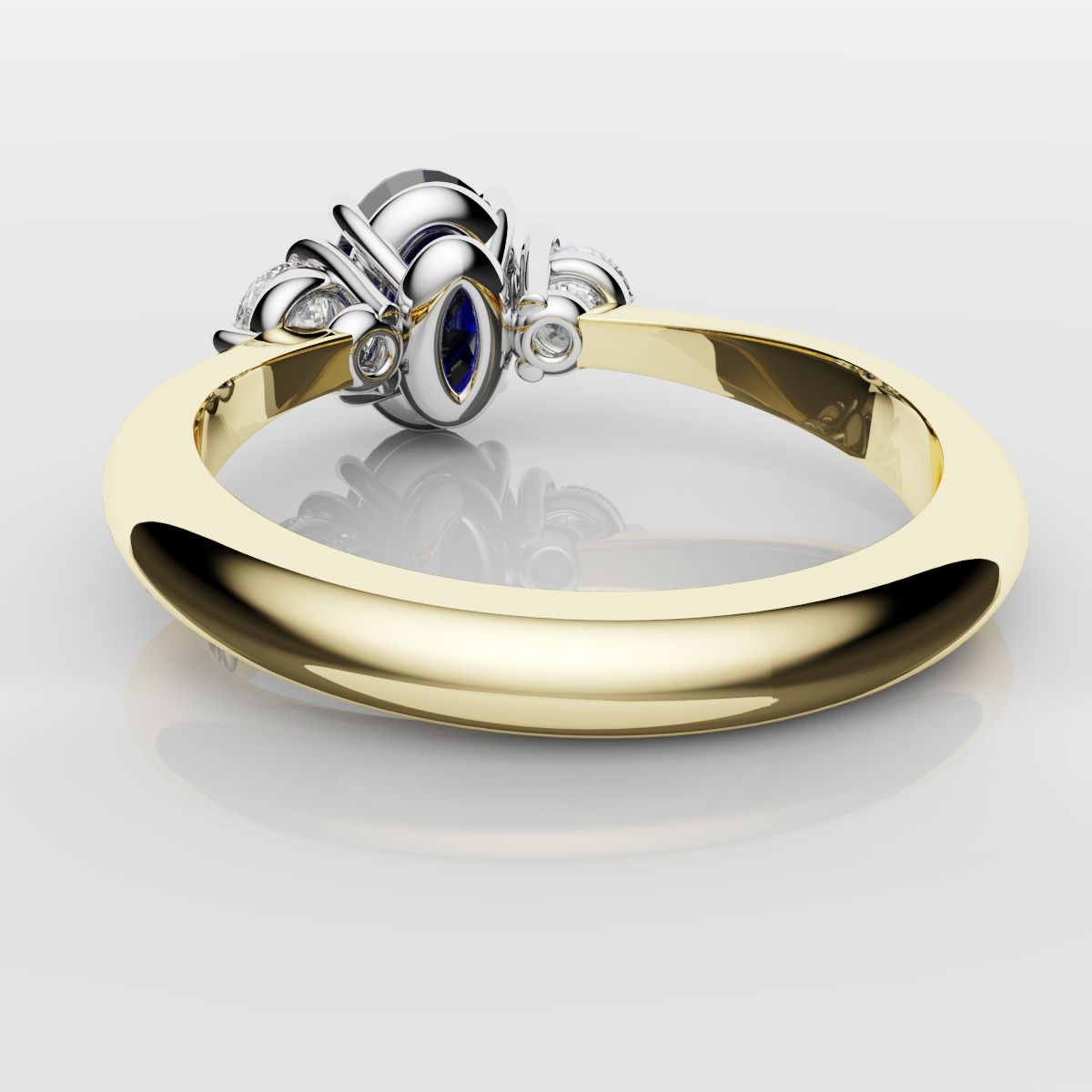 Oval Sapphire and Diamond Trilogy Engagement Ring