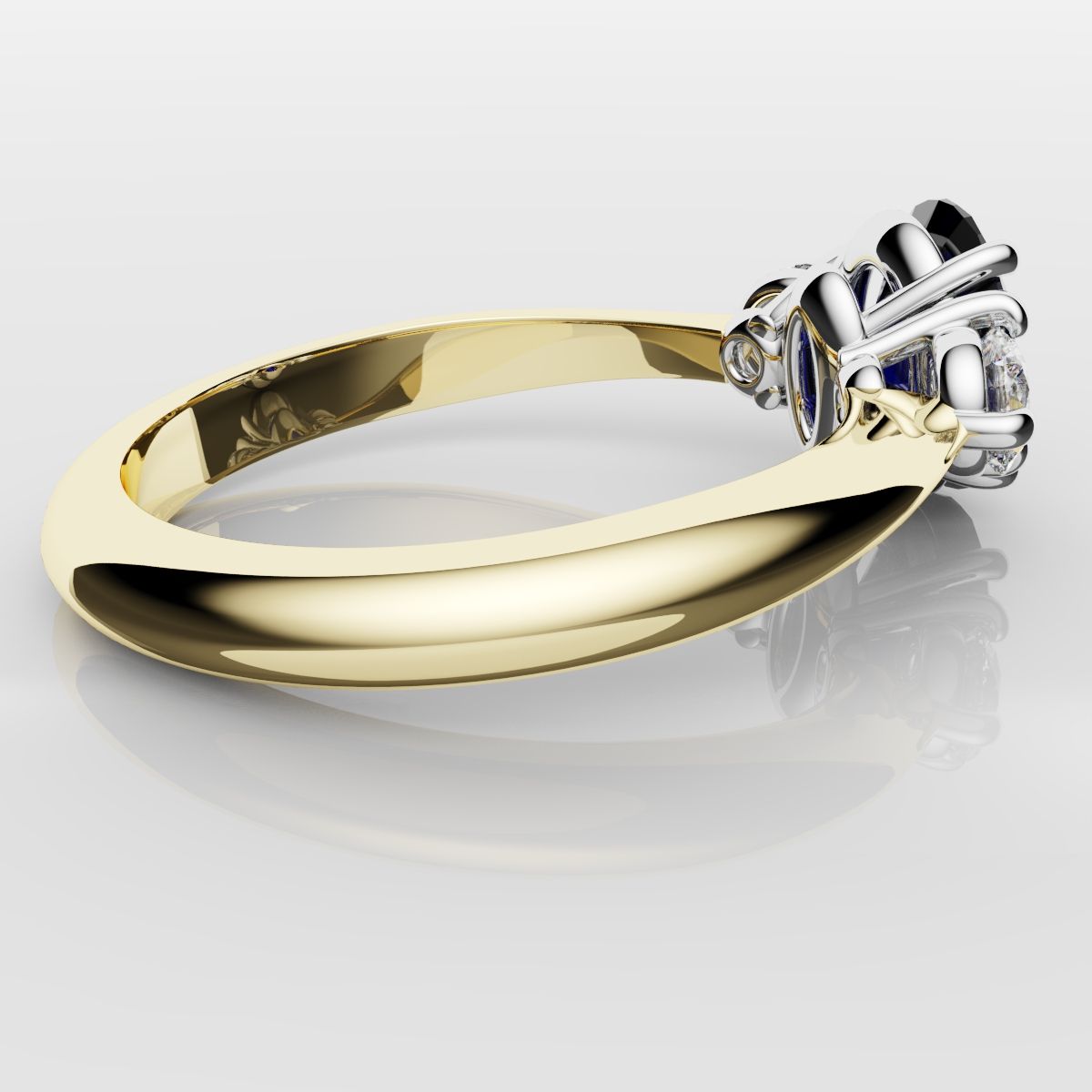 Oval Sapphire and Diamond Trilogy Engagement Ring