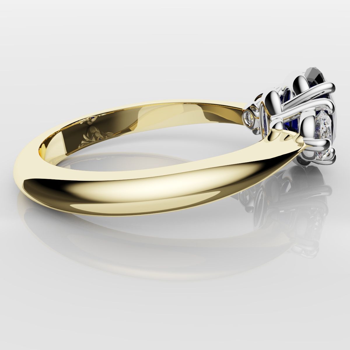 Oval Sapphire and Diamond Trilogy Engagement Ring
