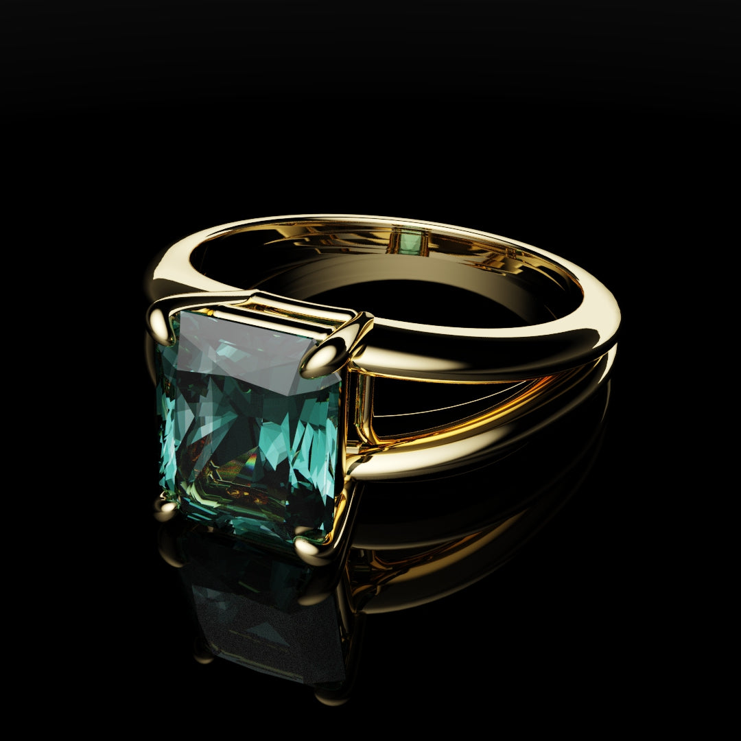 teal sapphire solitaire engagement ring yellow gold