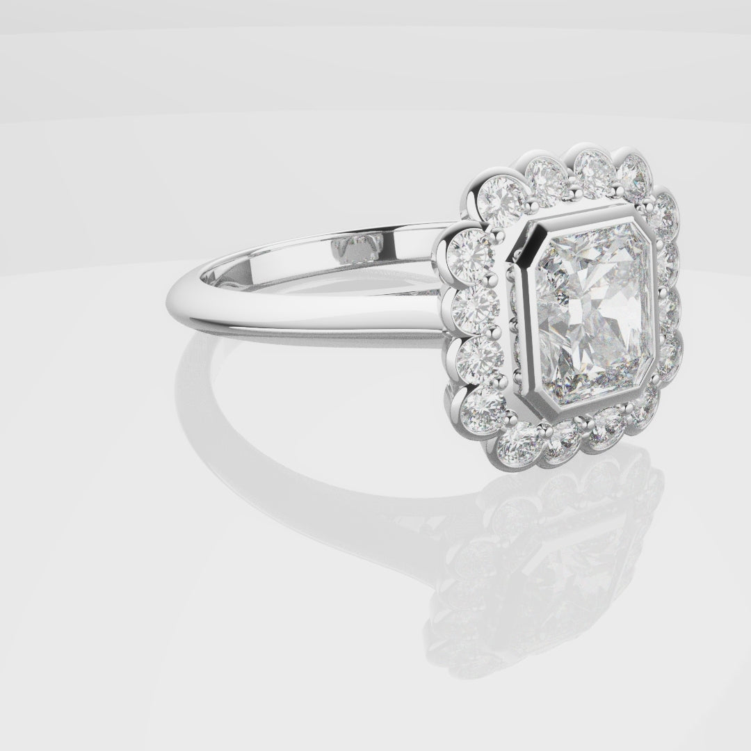 Radiant Cut Diamond Halo Engagement Ring With Rub-over Setting