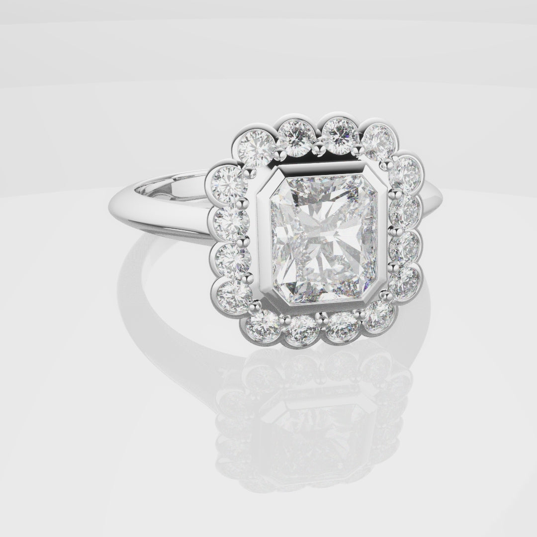Radiant Cut Diamond Halo Engagement Ring With Rub-over Setting