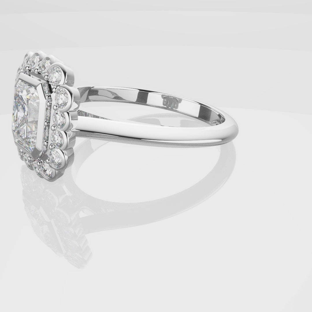 Radiant Cut Diamond Halo Engagement Ring With Rub-over Setting