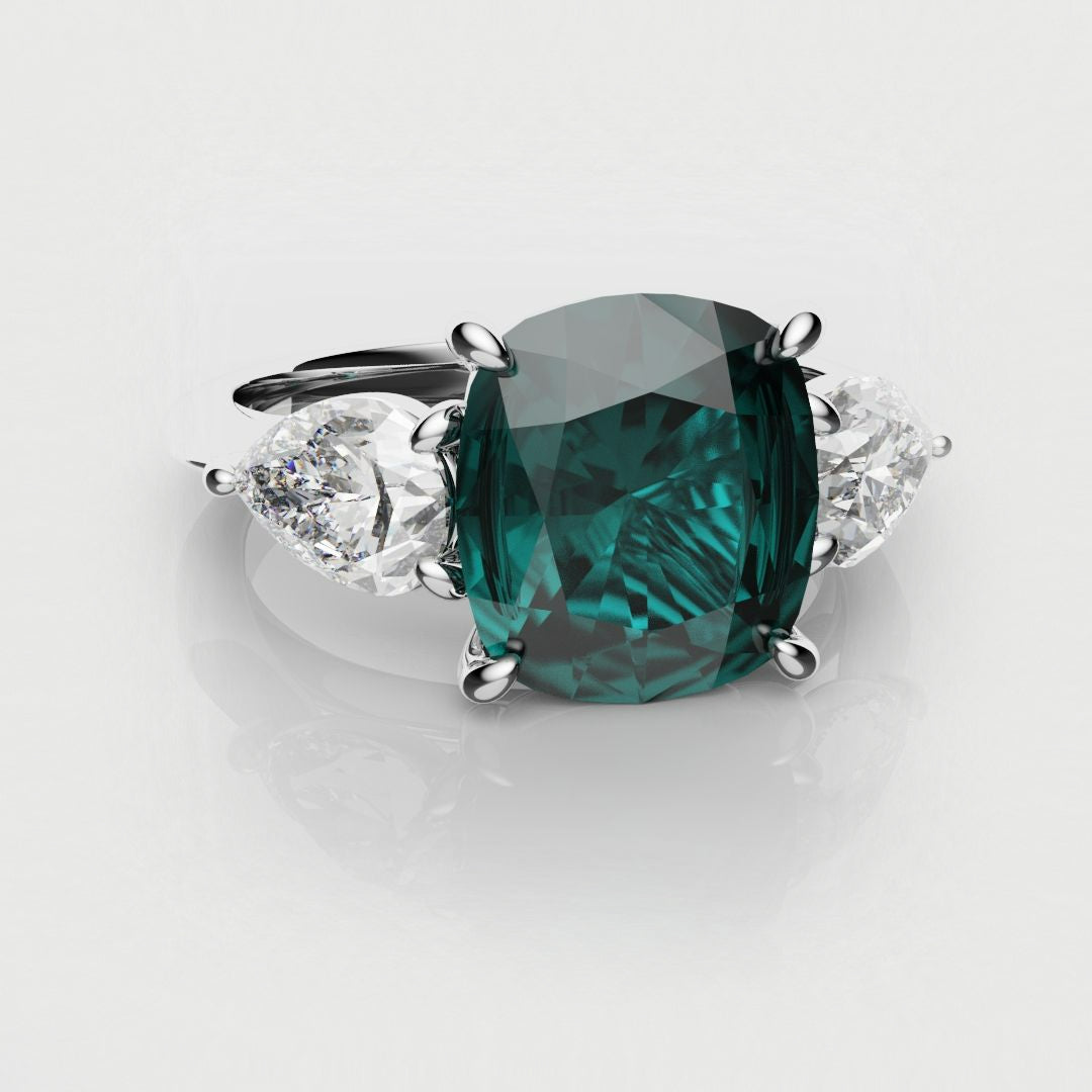 teal sapphire and diamond trilogy engagement ring