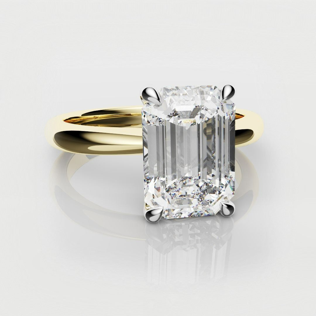 emerald cut solitaire engagement ring yellow gold