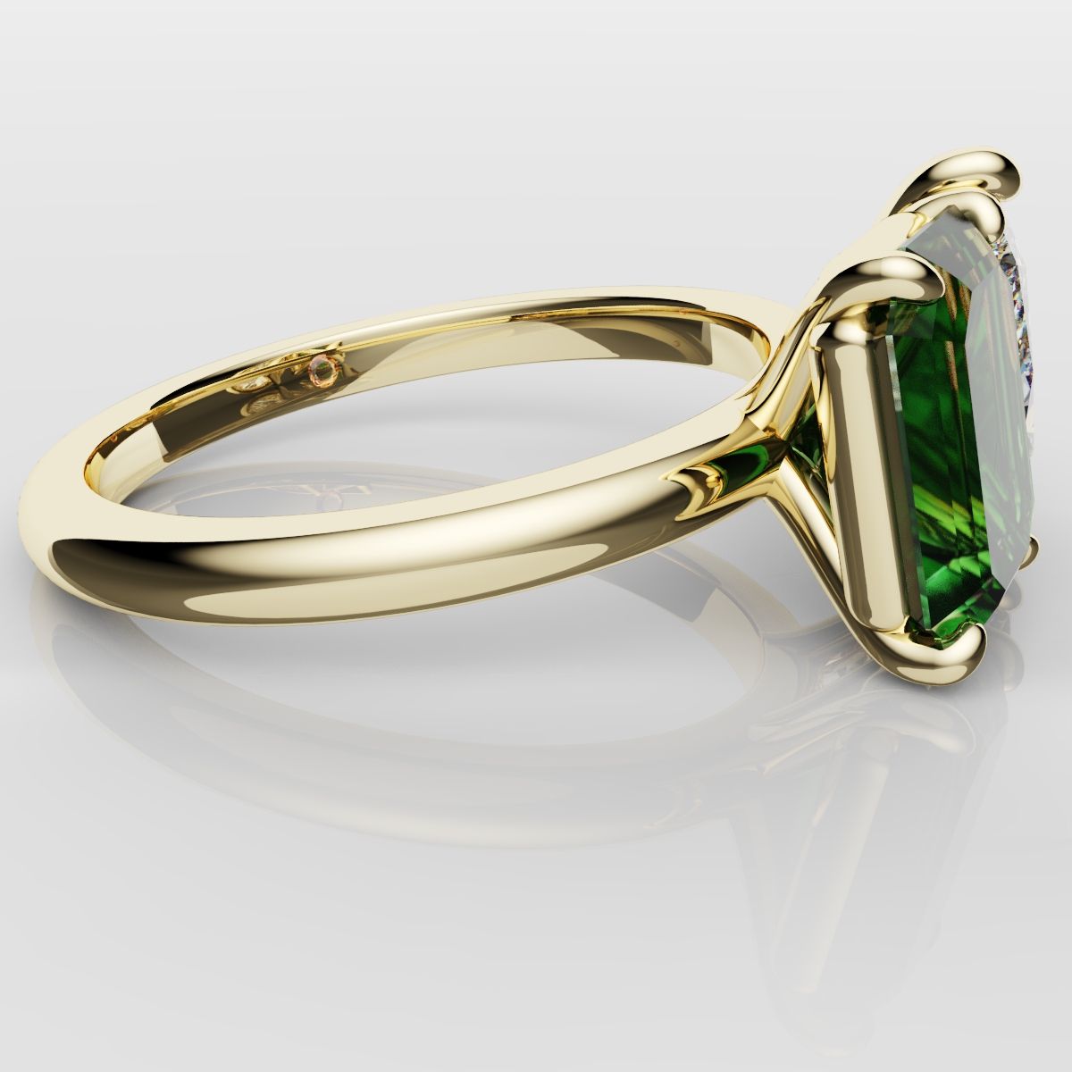 Emerald and Pear Diamond Two Stone Engagement Ring