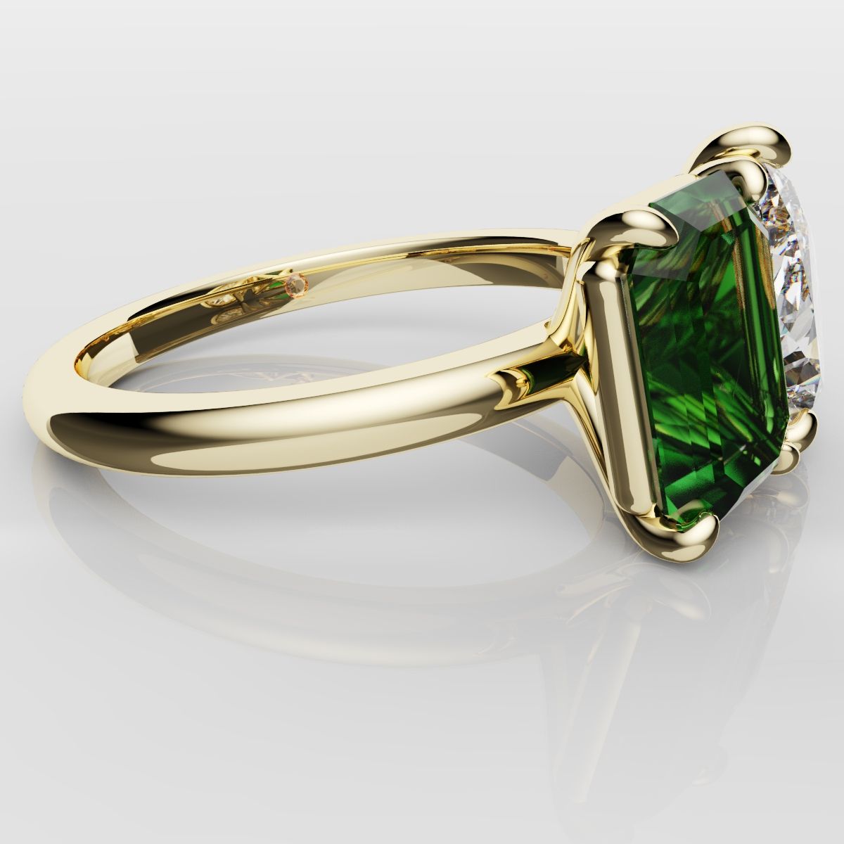 Emerald and Pear Diamond Two Stone Engagement Ring