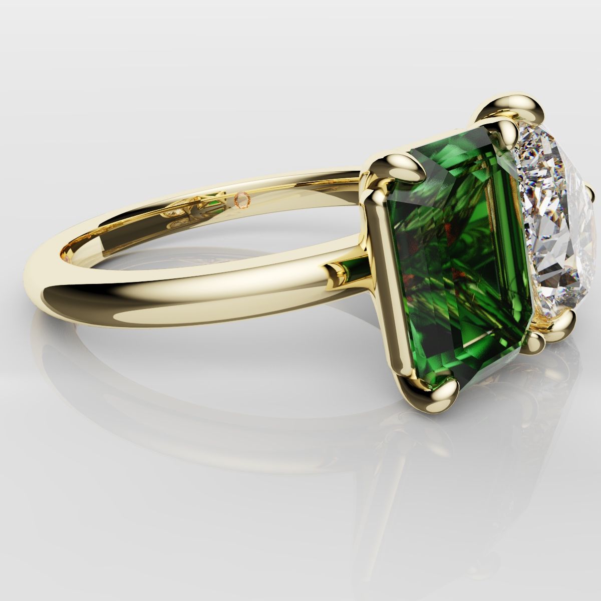 Emerald and Pear Diamond Two Stone Engagement Ring