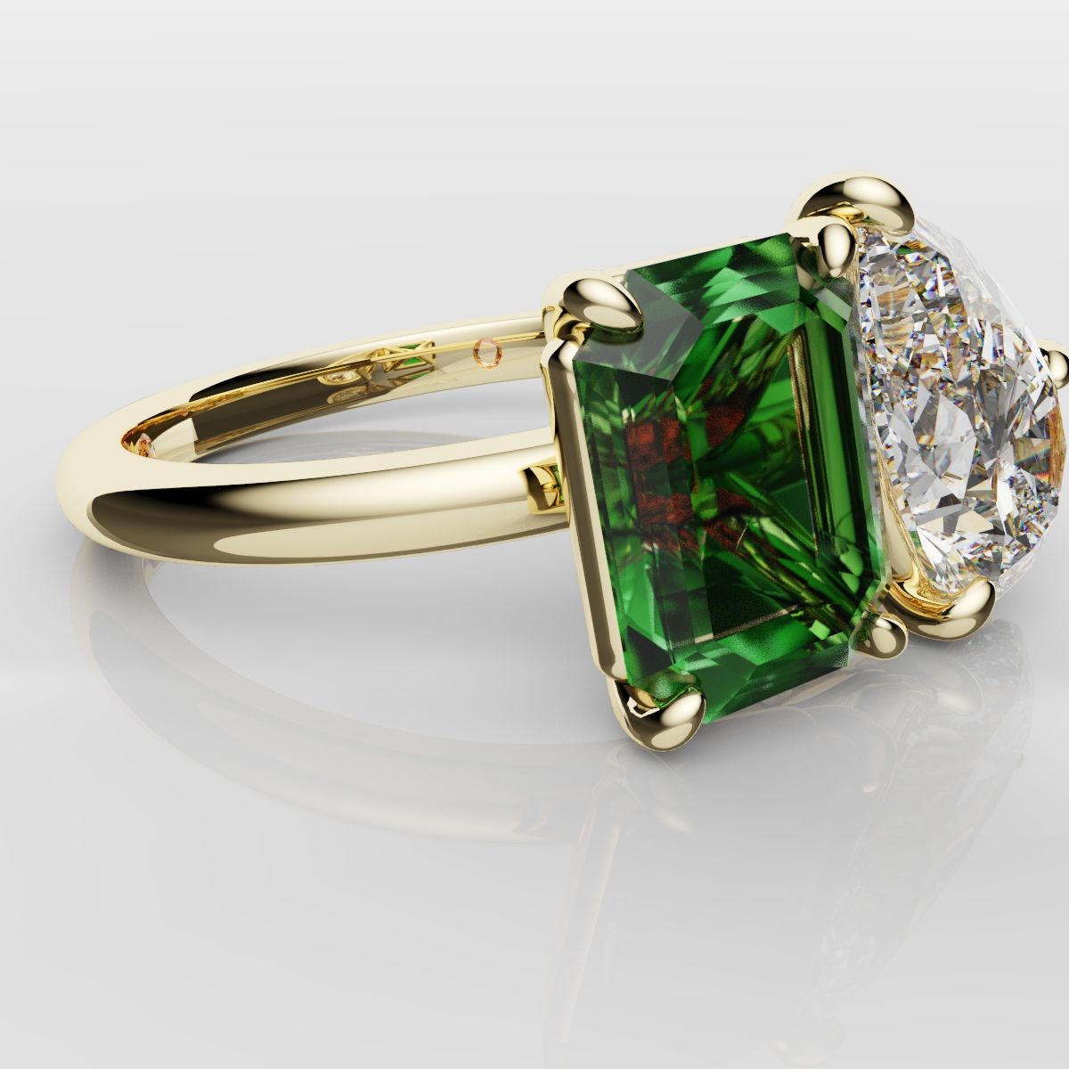Emerald and Pear Diamond Two Stone Engagement Ring