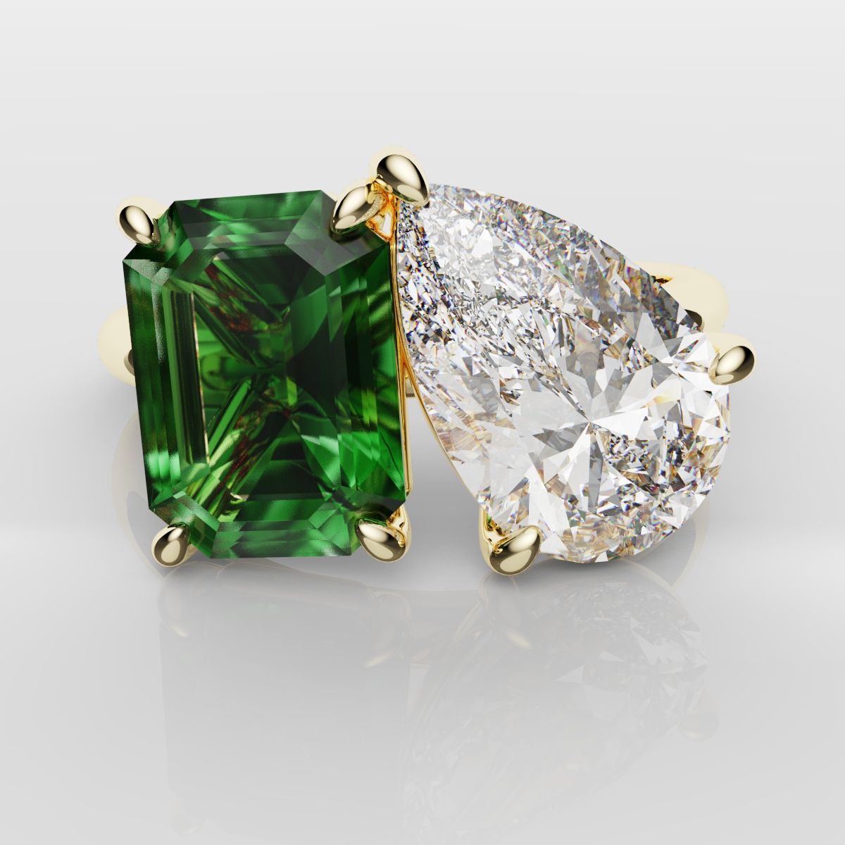 Emerald and Pear Diamond Two Stone Engagement Ring