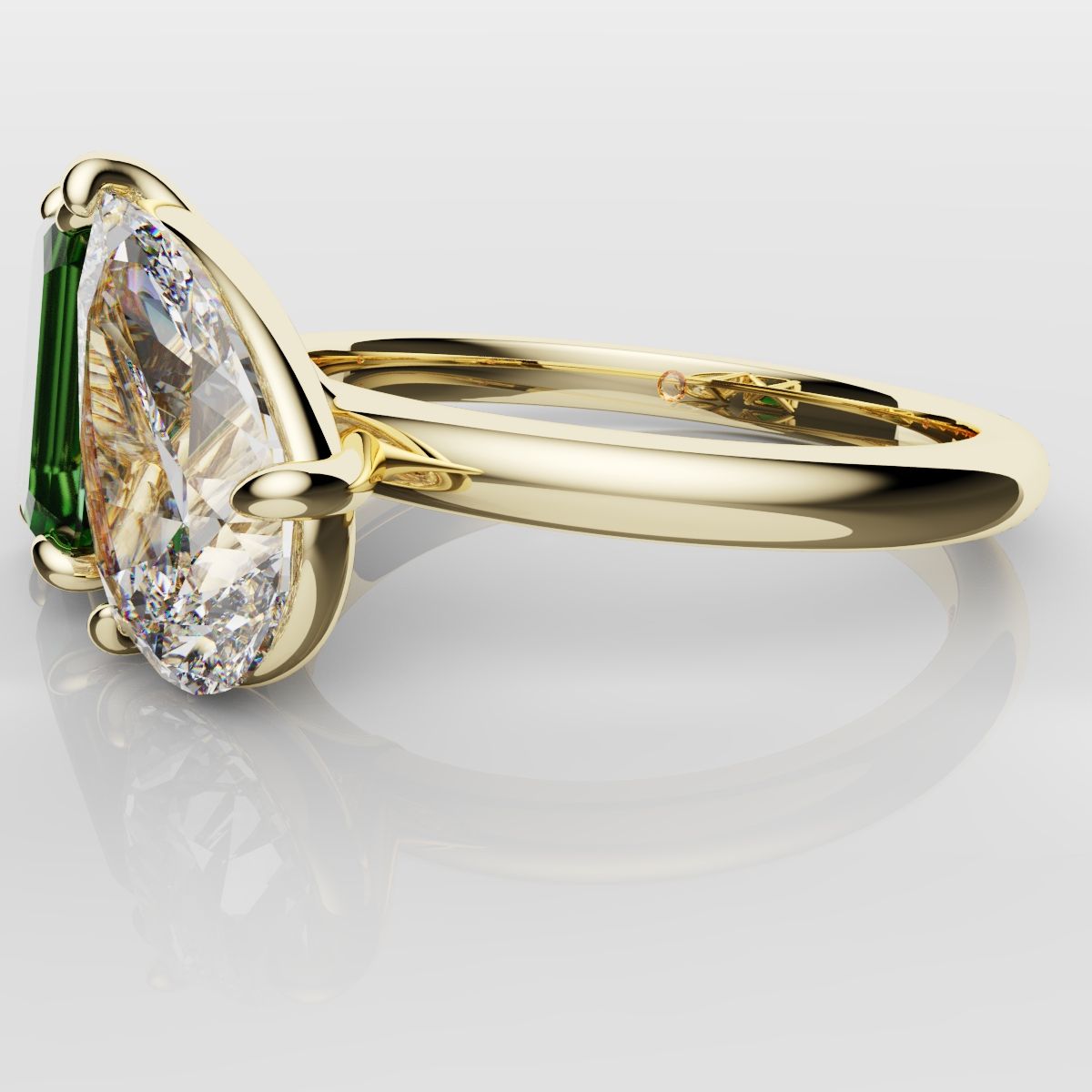 Emerald and Pear Diamond Two Stone Engagement Ring