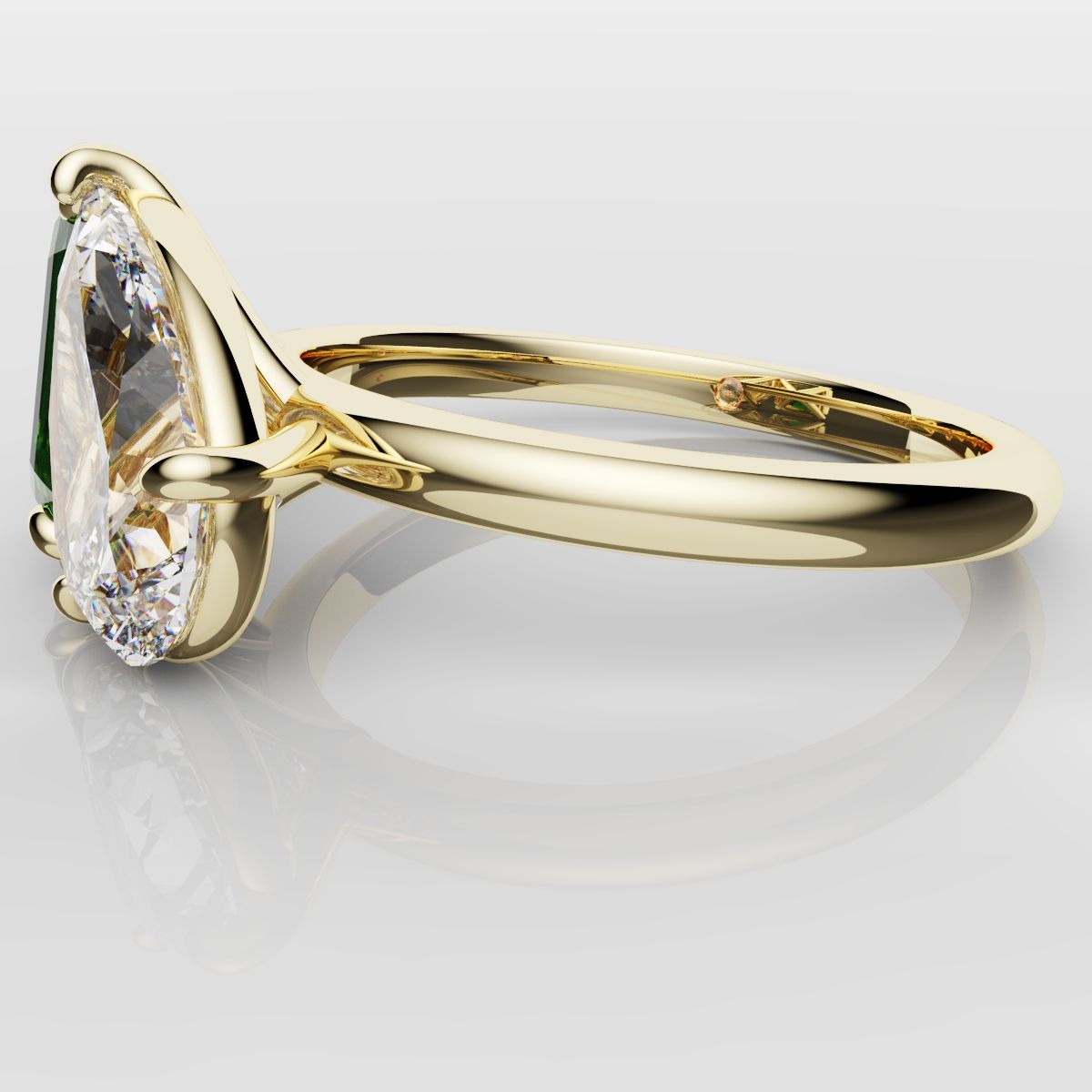 Emerald and Pear Diamond Two Stone Engagement Ring