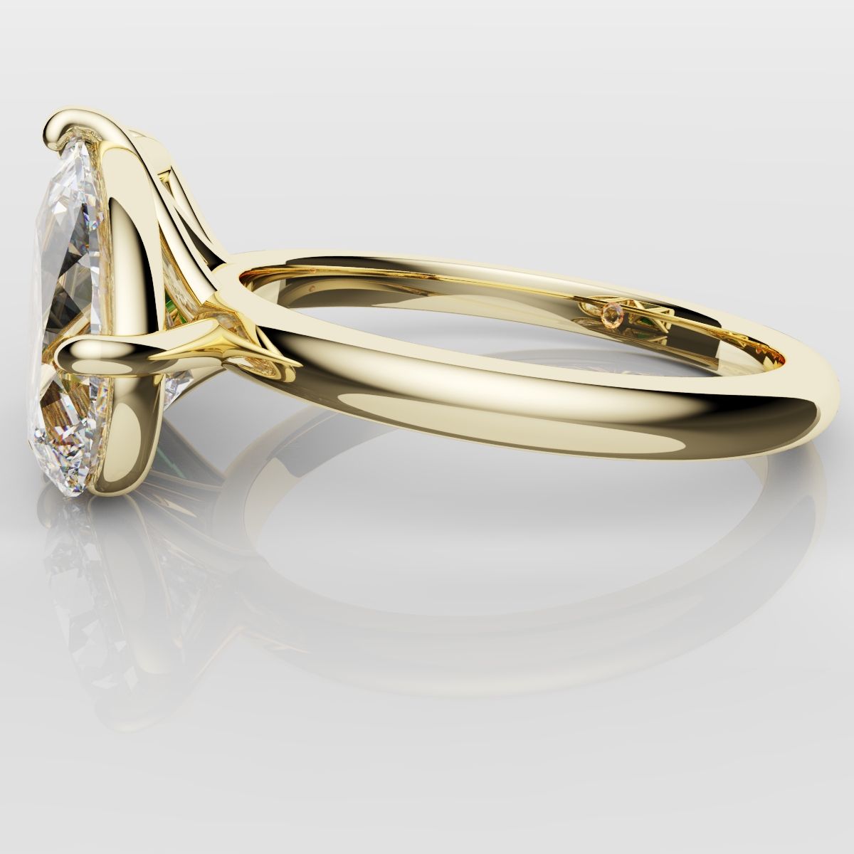 Emerald and Pear Diamond Two Stone Engagement Ring