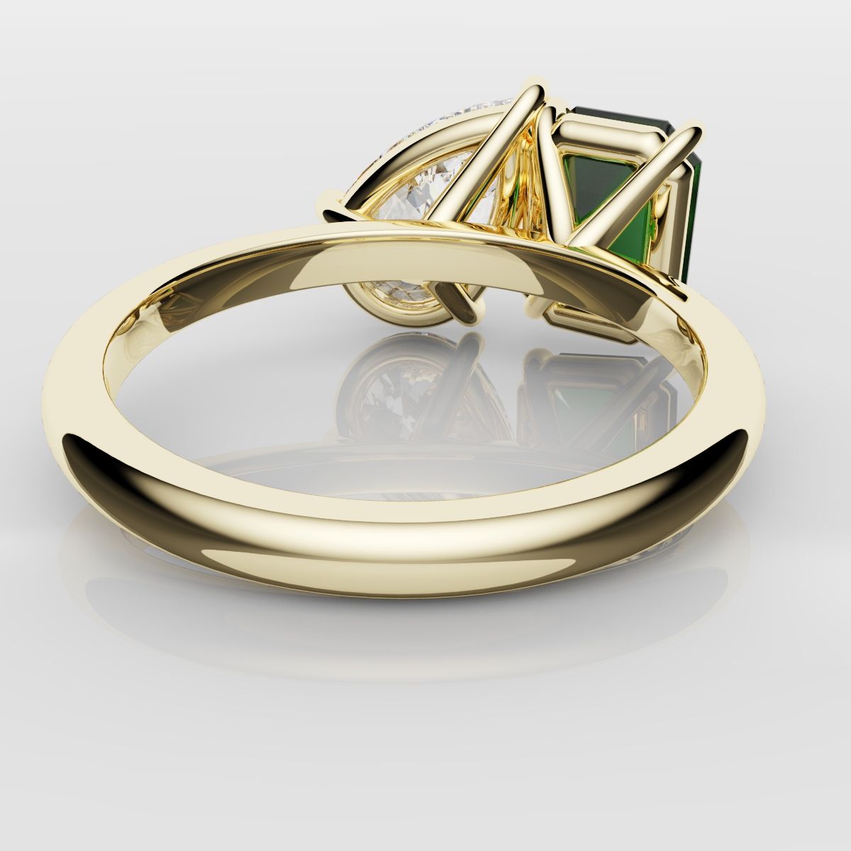 Emerald and Pear Diamond Two Stone Engagement Ring