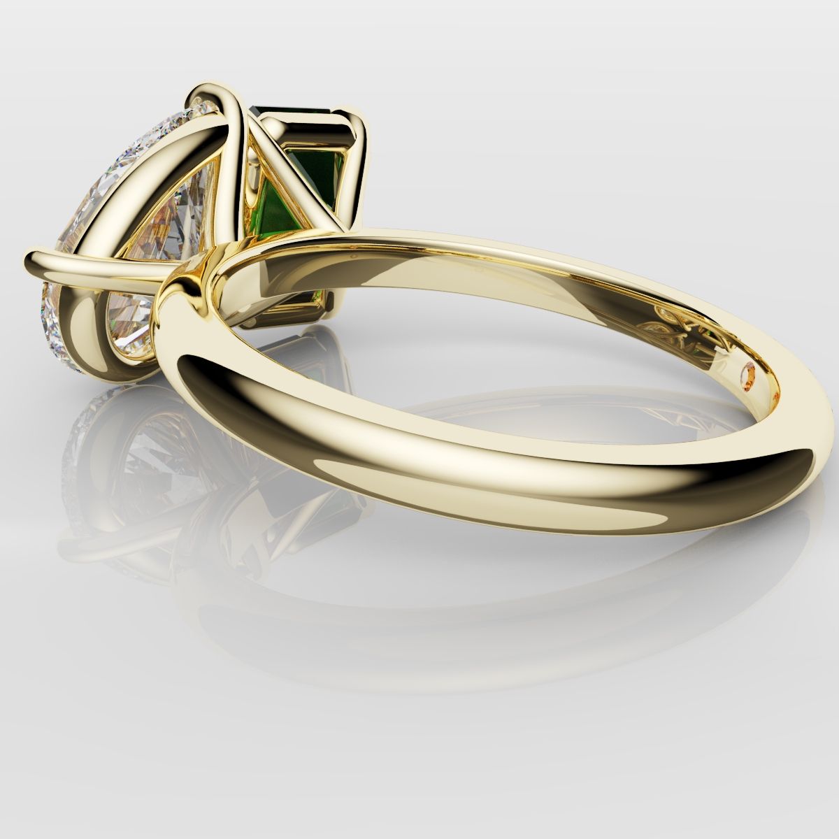 Emerald and Pear Diamond Two Stone Engagement Ring