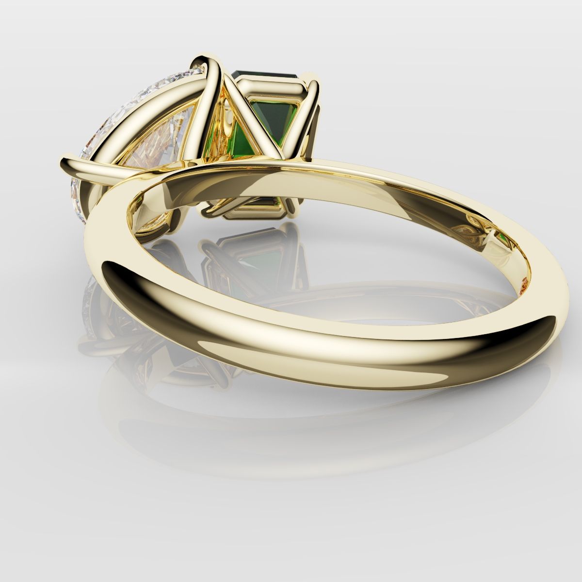 Emerald and Pear Diamond Two Stone Engagement Ring